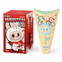Labubu Coca-Cola and CRYBABY Sad Club duo studio packshot on white